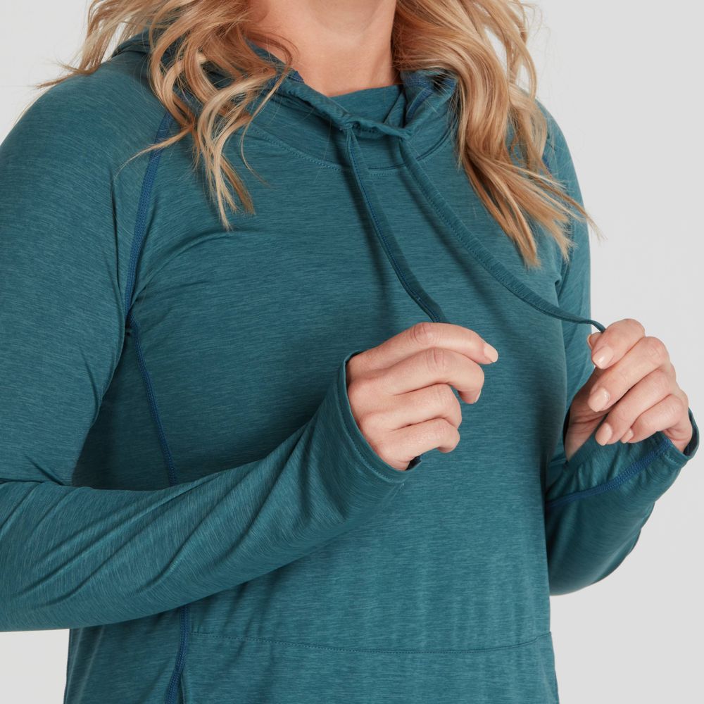 A person wears the teal Silkweight Hoodie Dress by NRS, made from recycled materials, holding the drawstrings.