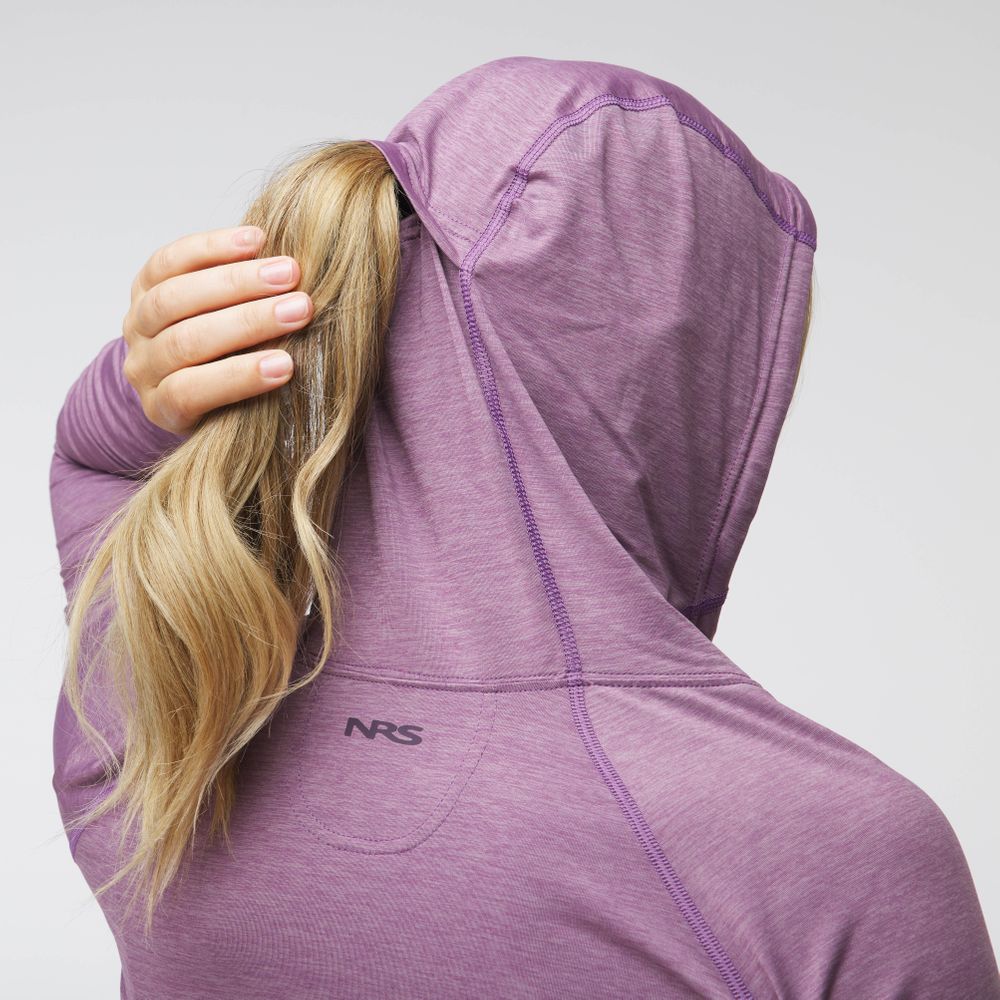 A person in an NRS Silkweight Hoodie Dress, crafted from recycled material with sun protection, seen from behind holding their ponytail; the purple fabric flows effortlessly with each movement.