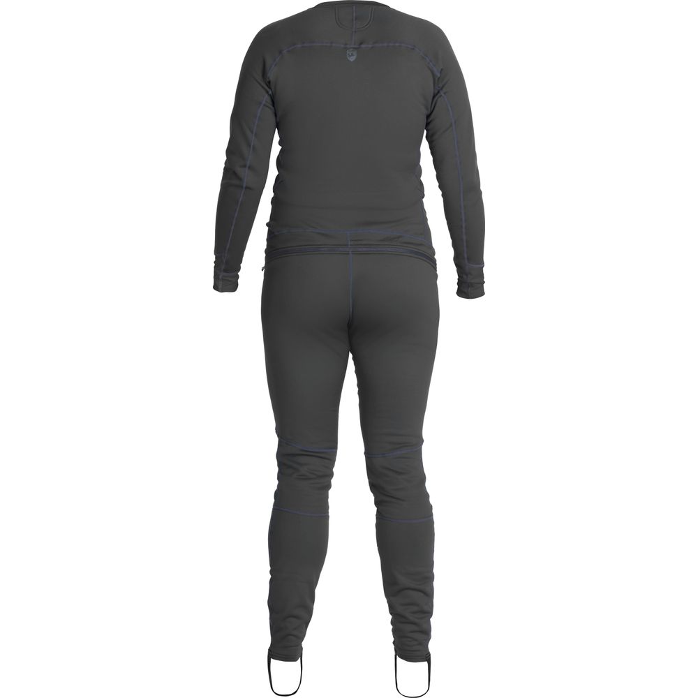 A female paddler is shown from behind wearing the NRS Expedition Weight Union Suit - Women's, a gray full-body thermal suit made from recycled materials, featuring foot straps for comfort and efficiency.