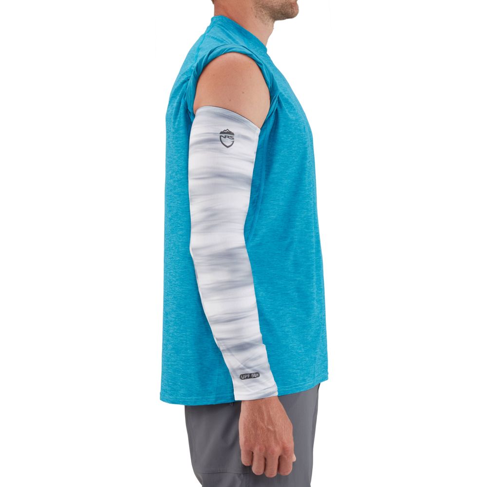 A man wears a blue sleeveless shirt with a gray NRS H2Ozone Sun Sleeve on his right arm. Made from lightweight fabric, this sleeve offers excellent sun protection while he stands confidently in profile.