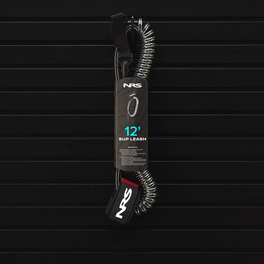 The NRS Coil SUP Leash, a 12-foot coiled leash ideal for stand-up paddling, is elegantly showcased in its packaging against a sleek black background.