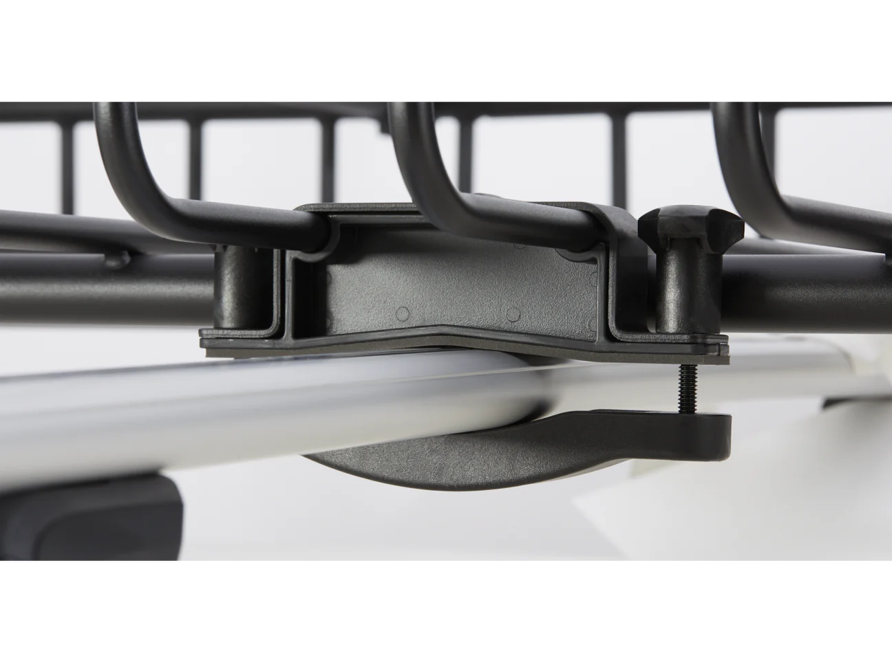 A black and white image of a Yakima Mega Warrior bike rack on a bike.