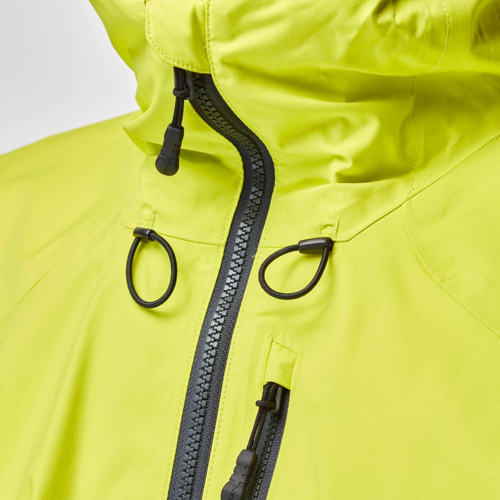 Close-up of the NRS High Tide Jacket - Men's in neon yellow, featuring a high collar, black zippers, adjustable toggles, and adjustable hood for waterproof paddling protection.