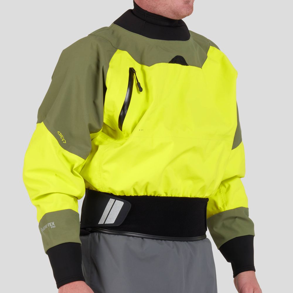 The person wears an NRS REV (GORE-TEX Pro) Drytop in bright yellow and olive green with a black neoprene waistband and gray lower section, highlighting exceptional paddling performance against the gray background.