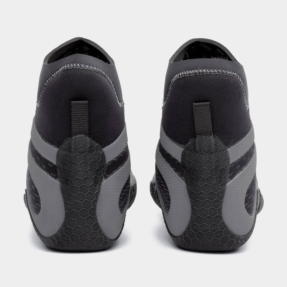 The NRS Freestyle WetShoe showcases a black and gray Terraprene neoprene back view, minimalist rubber soles with textured grip, and convenient pull tabs.