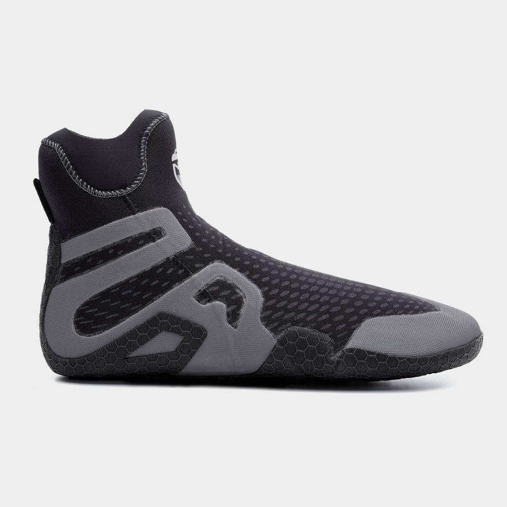The NRS Freestyle WetShoe, available in black and gray, is crafted with Terraprene neoprene and features a textured rubber sole plus an elastic ankle collar, making it ideal for water sports.