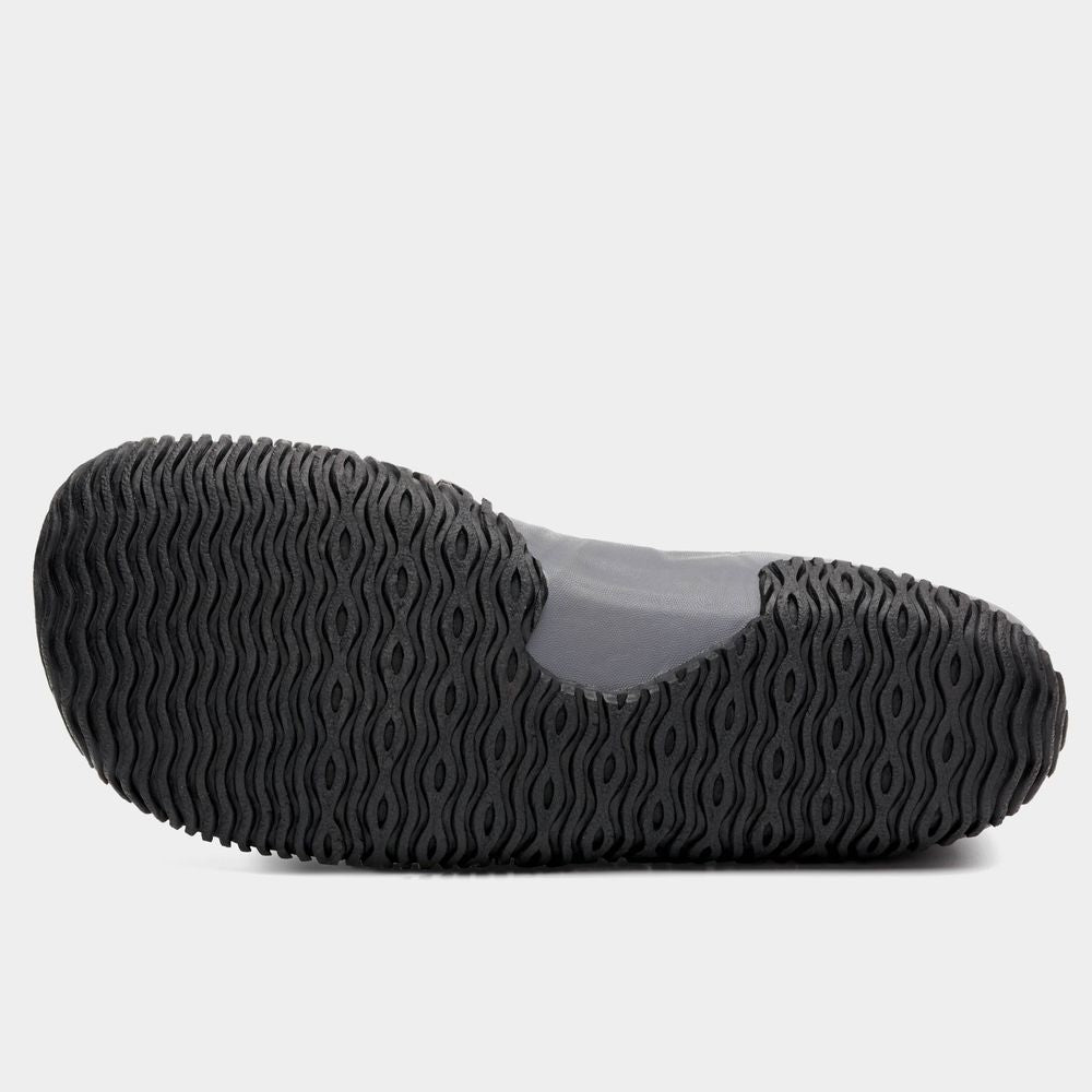 The image shows the sole of an NRS Paddle WetShoe featuring a high-traction, wavy tread pattern on a white background.