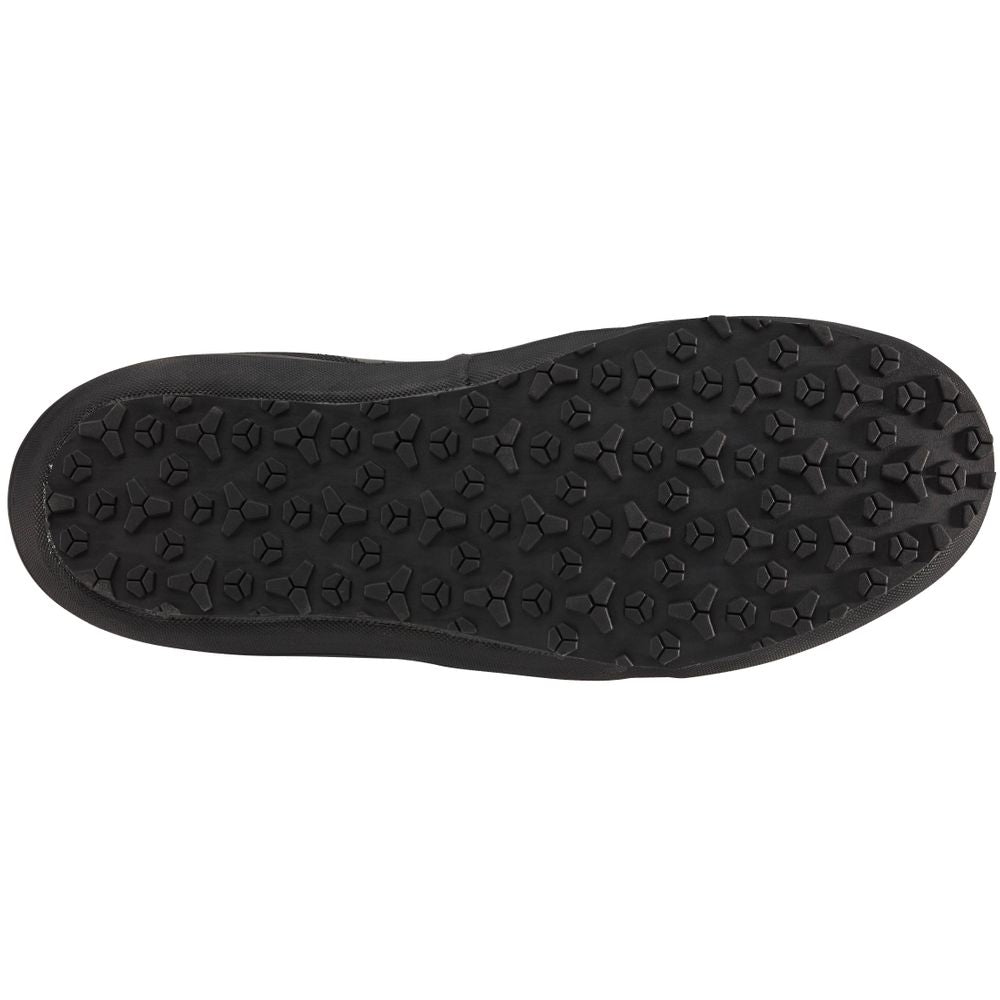 The image features the textured black sole of the NRS Boundary Boot, showcasing a waterproof design with a rugged pattern of hexagonal and circular studs.