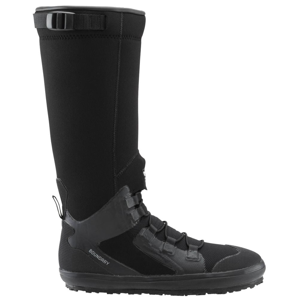 The NRS Boundary Boot is a tall, black waterproof boot with a neoprene upper, rubber sole, and reinforced toe and heel. Its rugged sole ensures durability on rough terrains, and a Velcro strap at the top allows for easy adjustment.