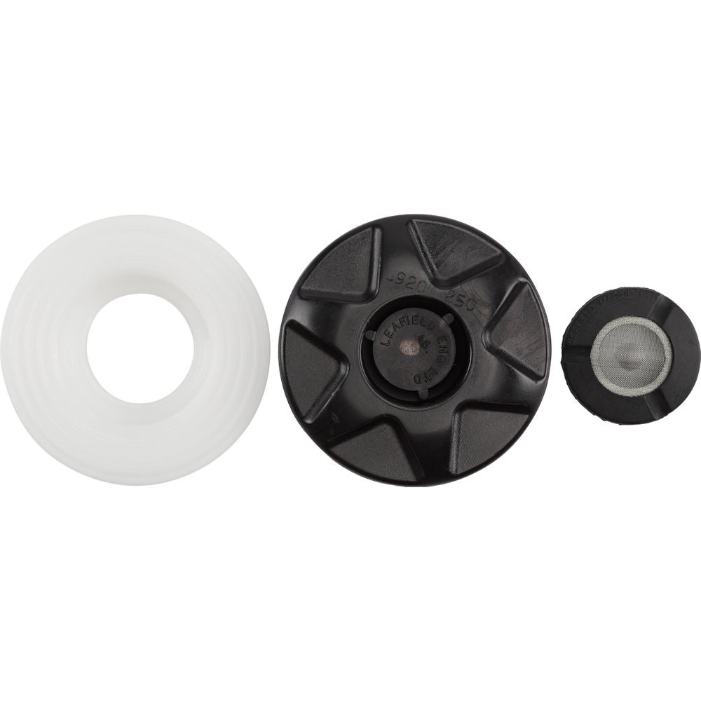 Three round objects are aligned horizontally: a spool-like item on the left, a black circular object resembling an NRS Leafield A6 Pressure Relief Valve - 2.5psi in the center, and a small black circular item similar to another pressure relief valve on the right.