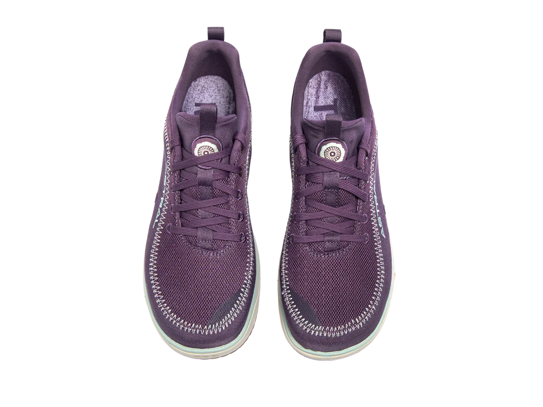 Astral Brewer 3.0 sneakers, purple lace-up with visible stitching, crafted from hydrophobic canvas, shown from above on a white background. Ideal for stylish kayakers seeking functionality.