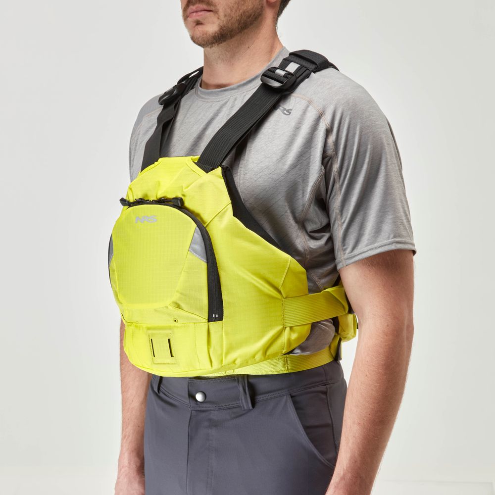A person wearing a yellow NRS Ninja PFD over a gray shirt and pants stands against a plain background.