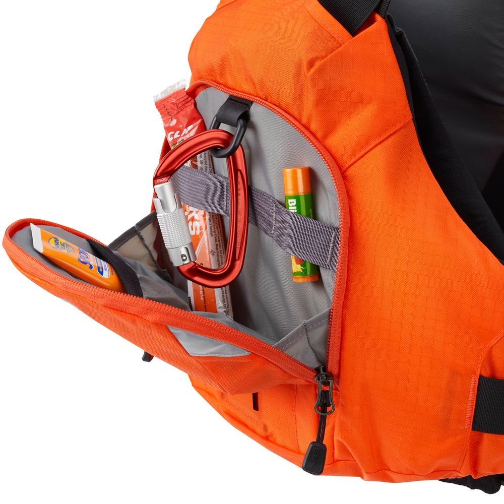 Open the orange backpack pocket to discover essentials for adventure—carabiner, sunscreen, lip balm, and an energy bar—perfectly complemented by the Orbit Fit System of your NRS Ninja PFD.