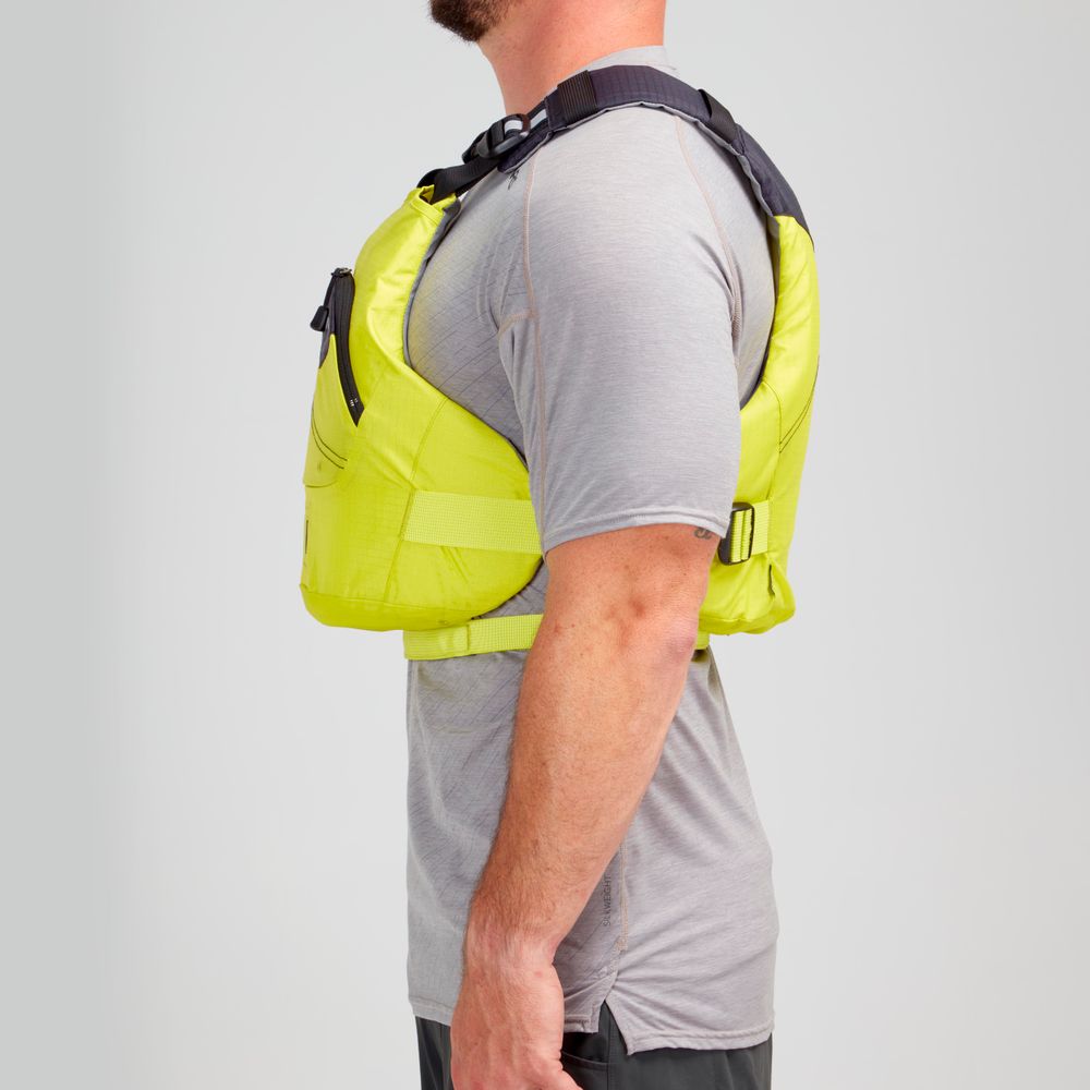 Wearing a gray shirt, the person confidently displays the NRS Ion PFD in profile. Crafted with ultra-soft foam for comfort and featuring the innovative Cool Flow System, this vibrant yellow Type III life vest offers safety and style against a plain backdrop.
