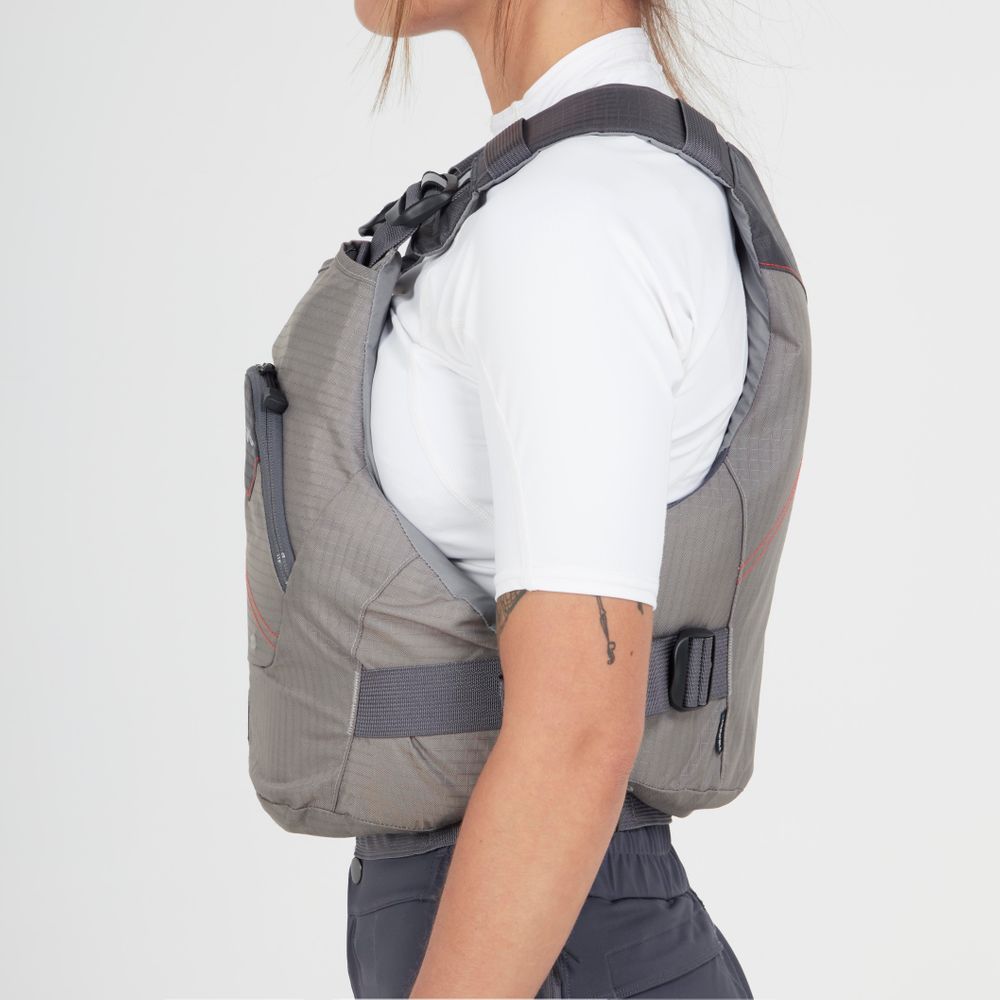 Side view of someone wearing a gray NRS Ion PFD over a white shirt, highlighting its ultra-soft foam for comfort.