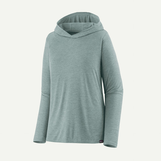 The Patagonia Cap Cool Daily Hoody - Womens is a light green, long-sleeve technical hoody with a relaxed fit, made from recycled polyester for better moisture evaporation, shown on a plain light background.