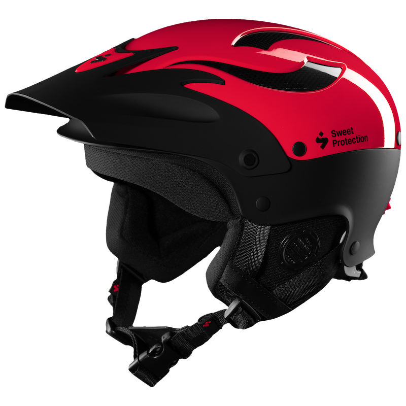 The Sweet Protection Rocker Helmet in red and black features a glossy finish, ventilation slits, and a chin strap. It includes TLC Shell Technology and the brand's signature on the side, providing excellent protection for whitewater adventures.