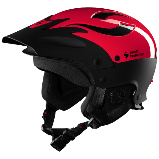 The Sweet Protection Rocker Helmet in red and black features a glossy finish, ventilation slits, and a chin strap. It includes TLC Shell Technology and the brand's signature on the side, providing excellent protection for whitewater adventures.