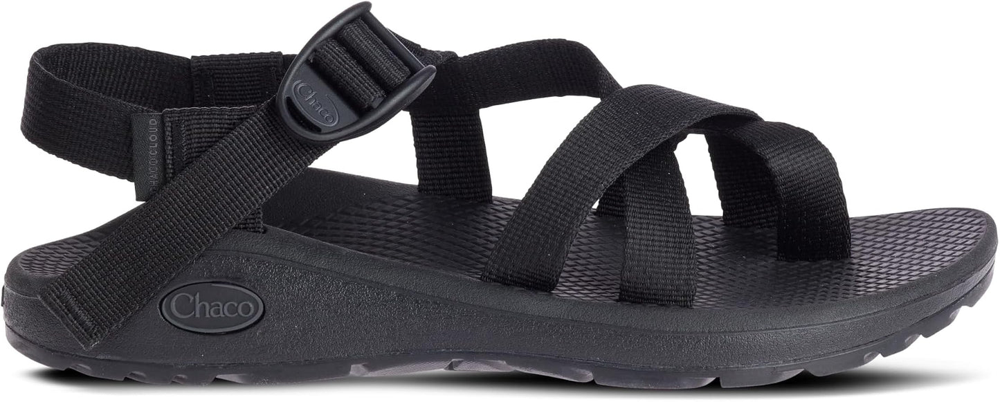 The Chaco ZCLOUD 2 - WOMEN'S sandal in black features adjustable straps and a textured sole, shown in side profile against a white background—perfect for outdoor adventure enthusiasts.