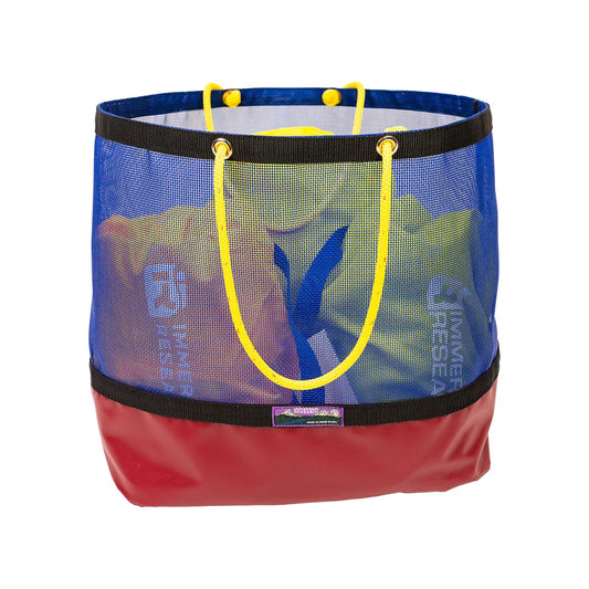 A blue Haulin Toats mesh tote bag from Immersion Research, featuring yellow handles and a red base, partially filled with colorful items.