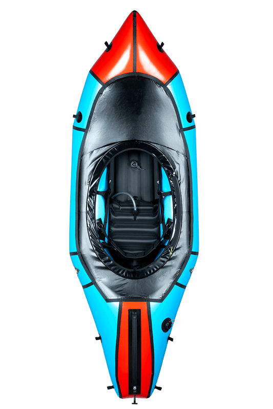 Aerial view of the Alpacka Mage inflatable kayak in blue and red, featuring a black seat and cockpit designed for whitewater performance, isolated on a white background.