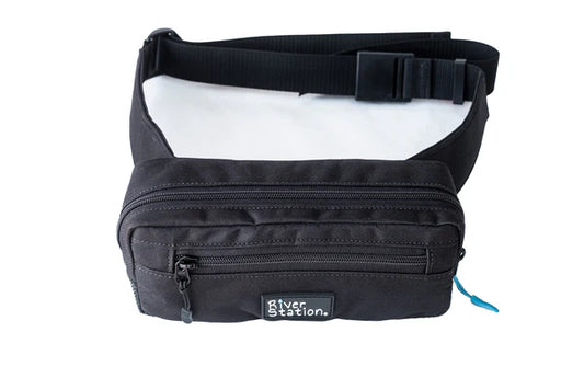 The Zip Hip Pack Waist Throw Bag by River Station Gear is a black waist bag with two zippered compartments and an adjustable quick-release strap, ideal for carrying essentials in a compact, easy-access design.