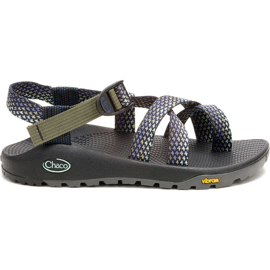 The Chaco Z2 Rapid Pro - Women's sandal features adjustable blue patterned straps, a green buckle strap, black textured footbed, and a rugged black Vibram outsole designed for water performance.