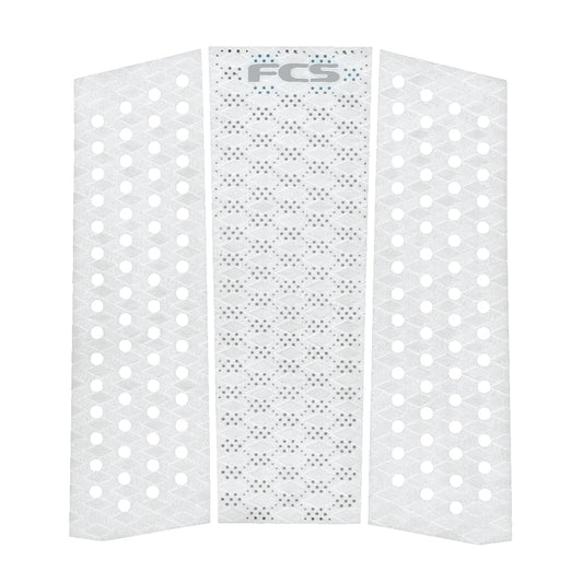The FCS T-3 Mid Eco Traction Pad is a white, three-piece pad with hexagonal and circular perforations, a textured grip surface, and an "FCS" logo at the top—designed for performance fiberglass boards.