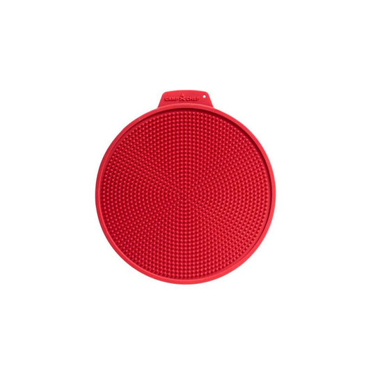 A red circular Silicone Hot Pad by Camp Chef on a white background, perfect for outdoor dining or as a camping essential.