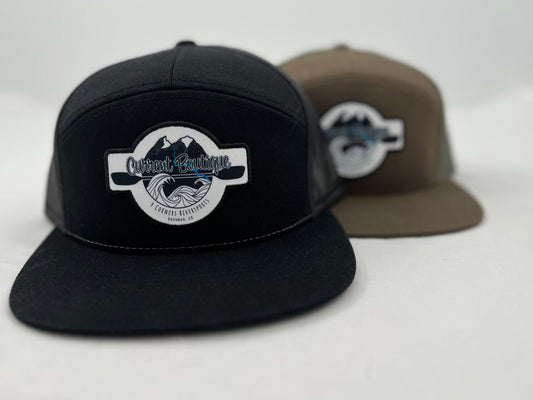 Two Current Boutique 7 Panel Patch Hats with a Captuer Headwear logo on them.