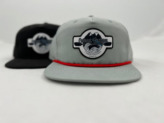 A grey and black snapback hat with a logo on it called the Captuer Headwear Current Boutique Pops Patch Hat.