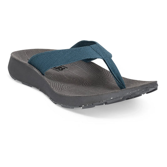 The Men's Orleans Sandal by Tread Labs features a blue and gray flip-flop design with a textured sole and thick fabric strap made from recycled polyester yarns, shown against a white background.