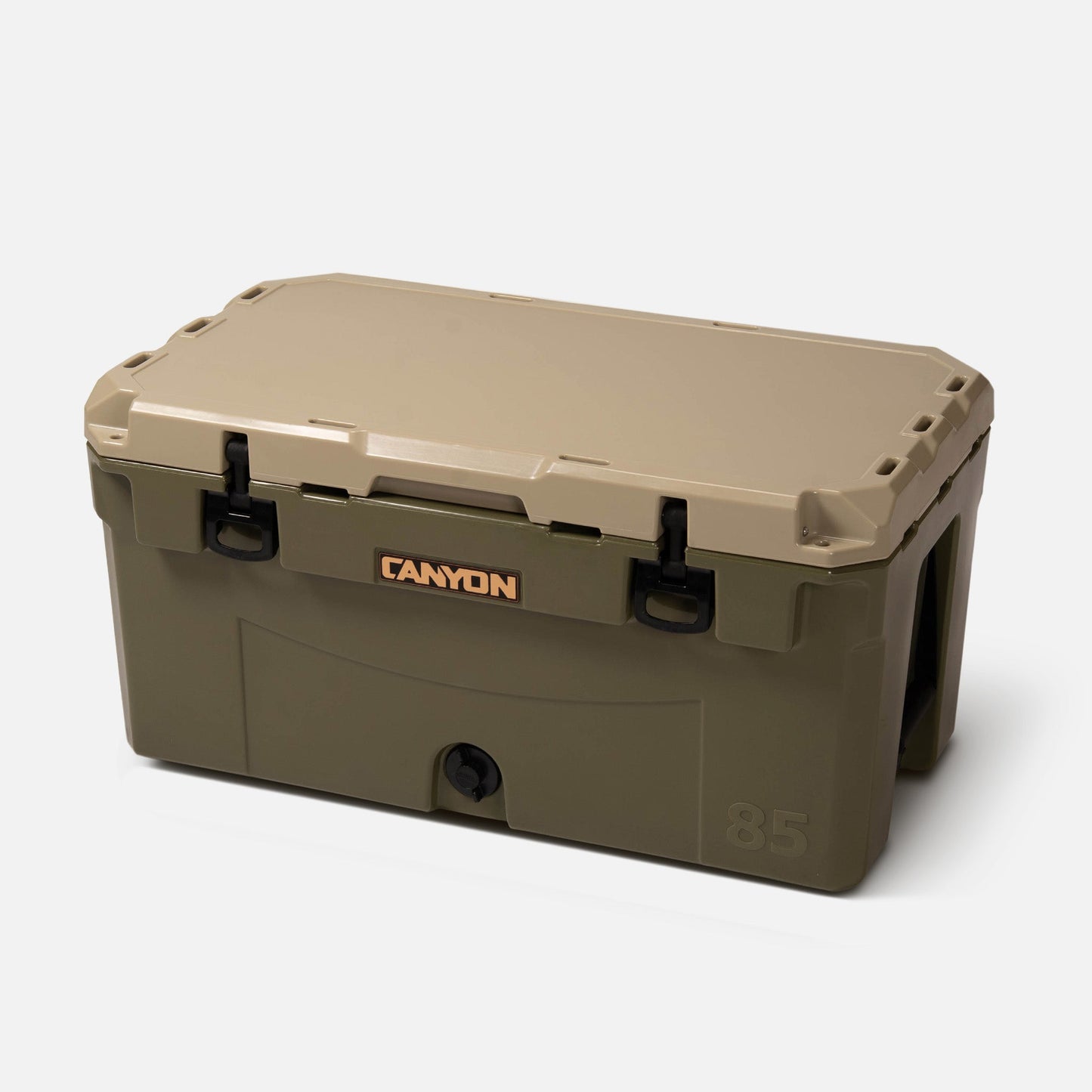 The PRO 85 Raft Cooler by Canyon Coolers is a large rectangular olive and tan rotomolded cooler with black latches and a Canyon logo, built for superior ice retention on all your adventures.