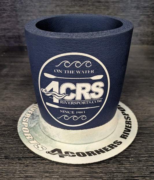 A blue Lil' Sucker Boozie beer holder with the 4CRS logo and website sits on a round coaster, both featuring 4CRS branding.