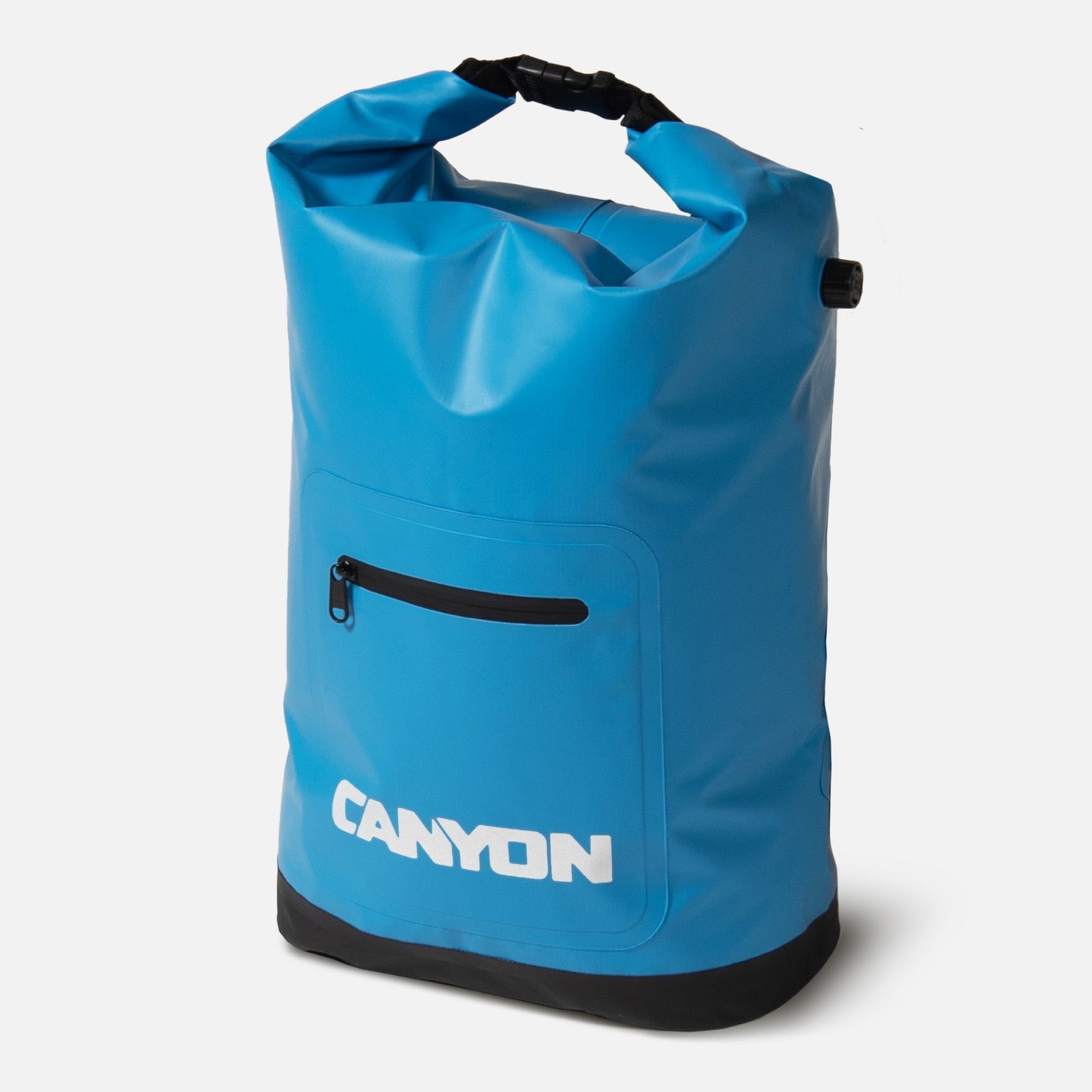 The Coulee Backpack Cooler from Canyon Coolers is a blue waterproof dry bag with cushioned straps for comfort, a roll-top closure, and a front zippered pocket. The brand name "Canyon" is displayed in white letters at the bottom.