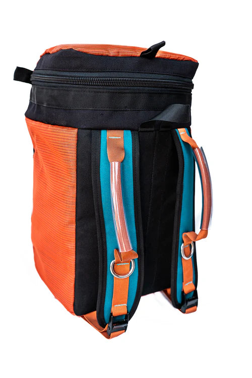 The Thwart Bag - Rafting Mesh Gear Bag by River Station Gear stands upright on a white background, showcasing orange and black colors with teal and orange straps and convenient gear attachment points.