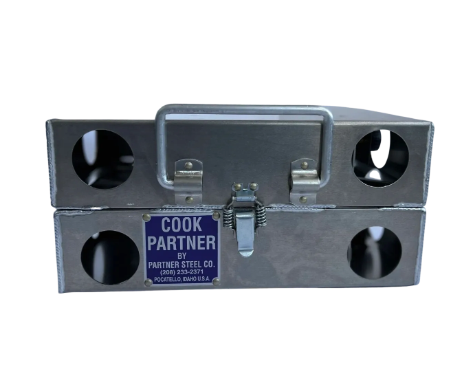 Two metal boxes with the words Partner Steel cook partner on them.