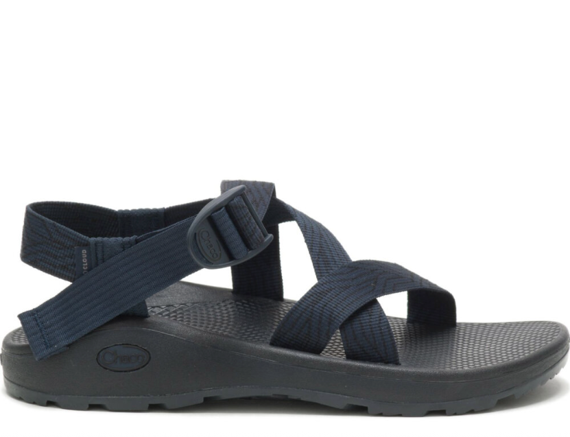 The Chaco ZCloud - Men's sandal in dark blue features adjustable straps and a textured sole, shown in side profile against a white background—ideal for comfortable hiking adventures.