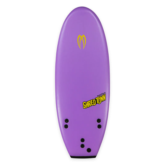 The Badfish ShredTown Surf Board is a high-performance purple foamy with a yellow logo near the top, "Shred Town" on the lower right, a square tail, and multiple fin slots for versatile river wave riding.