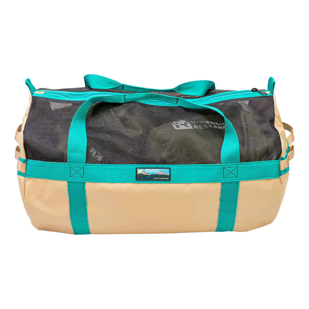 The World Class Gear Bag by Immersion Research is a beige and turquoise duffel with a black mesh top, multiple handles, and crafted from vinyl-coated polyester. Featuring a heavy-duty zipper, this durable bag is perfect for adventurers. Pictured against a white background.