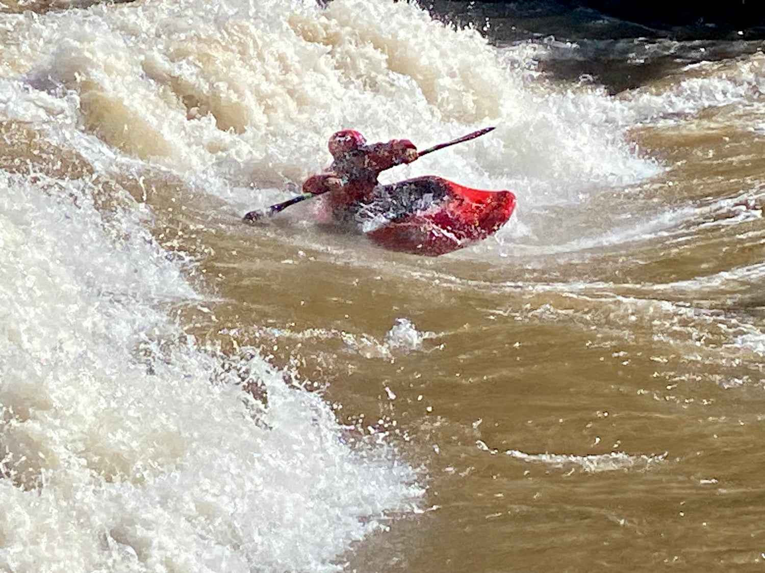Kevin Heiner surfing Ponderosa wave in Smelter rapid.