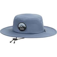 The Heyday Boonie Hat by Outdoor Research is a blue wide-brimmed hat featuring a drawstring and a patch with white mountains and the brand's name.