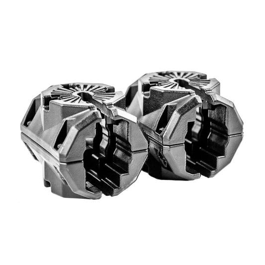 Two black plastic hose or pipe connectors with interlocking grips, perfect for use as kayak accessory mounts or with the YakAttack MightyMount Duo Rail Adapter, are shown against a white background.