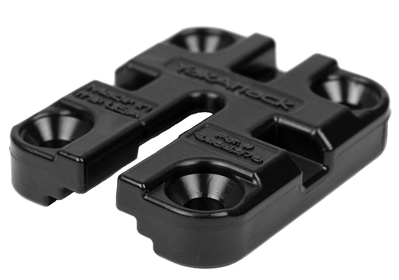 A black plastic YakAttack MightyMount II kayak accessory mount with four countersunk screw holes and "Magpul" embossed on the surface.