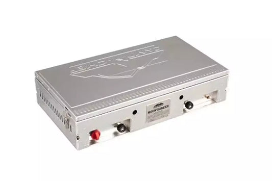 A portable silver box with two wires on it, perfect for an outdoor kitchen or Camp Chef Mountaineer Camp Stove.