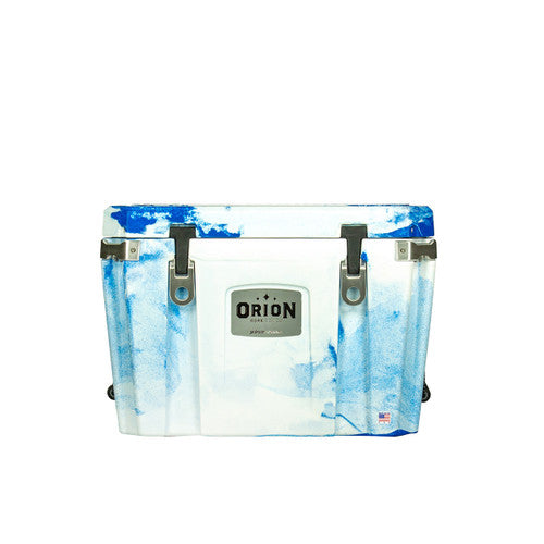 An Jackson Kayak Orion Coolers cooler with blue paint on it, designed for outdoor adventures.