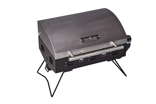 A portable stainless steel Camp Chef Portable BBQ Grill on a stand on a white background.
