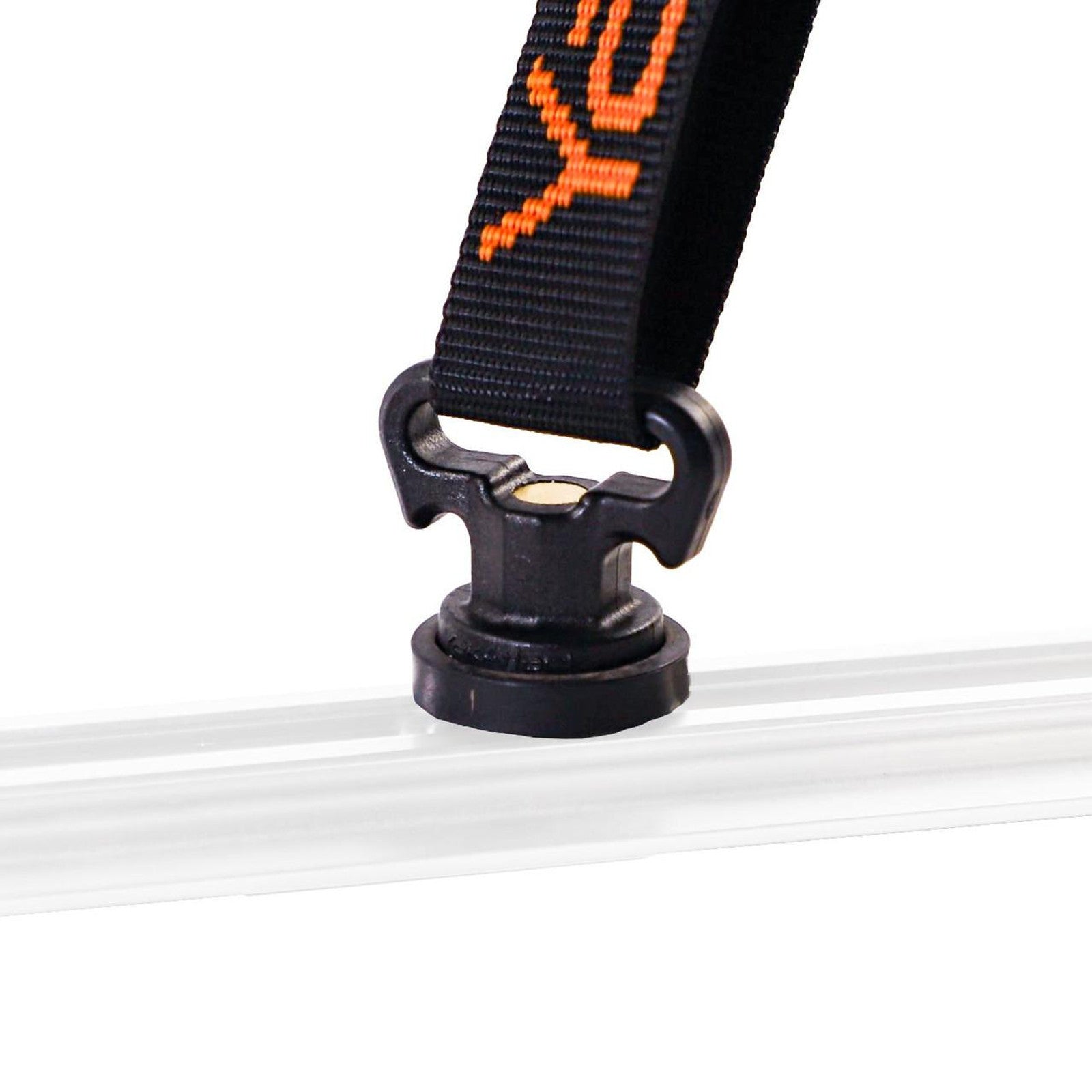 The YakAttack Vertical Tie Down - Pair is a black plastic clip with an attached strap, secured onto a clear horizontal rod, and compatible with kayak track systems like GearTrac.