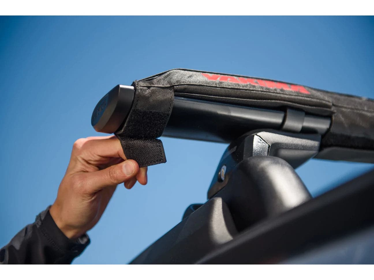 Featuring the 30 inch Aero Crossbar Pad bike mount, fishing accessory, rec kayak accessory, snow mount, tour kayak accessory, transport manufactured by Yakima shown here from a fourth angle.