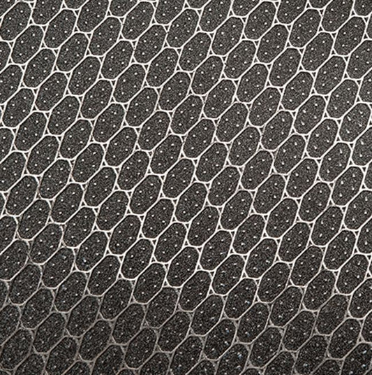 Interconnected hexagonal shapes with a dotted texture, reminiscent of the GSI Outdoors Gourmet Griddle, all in sleek black and white.